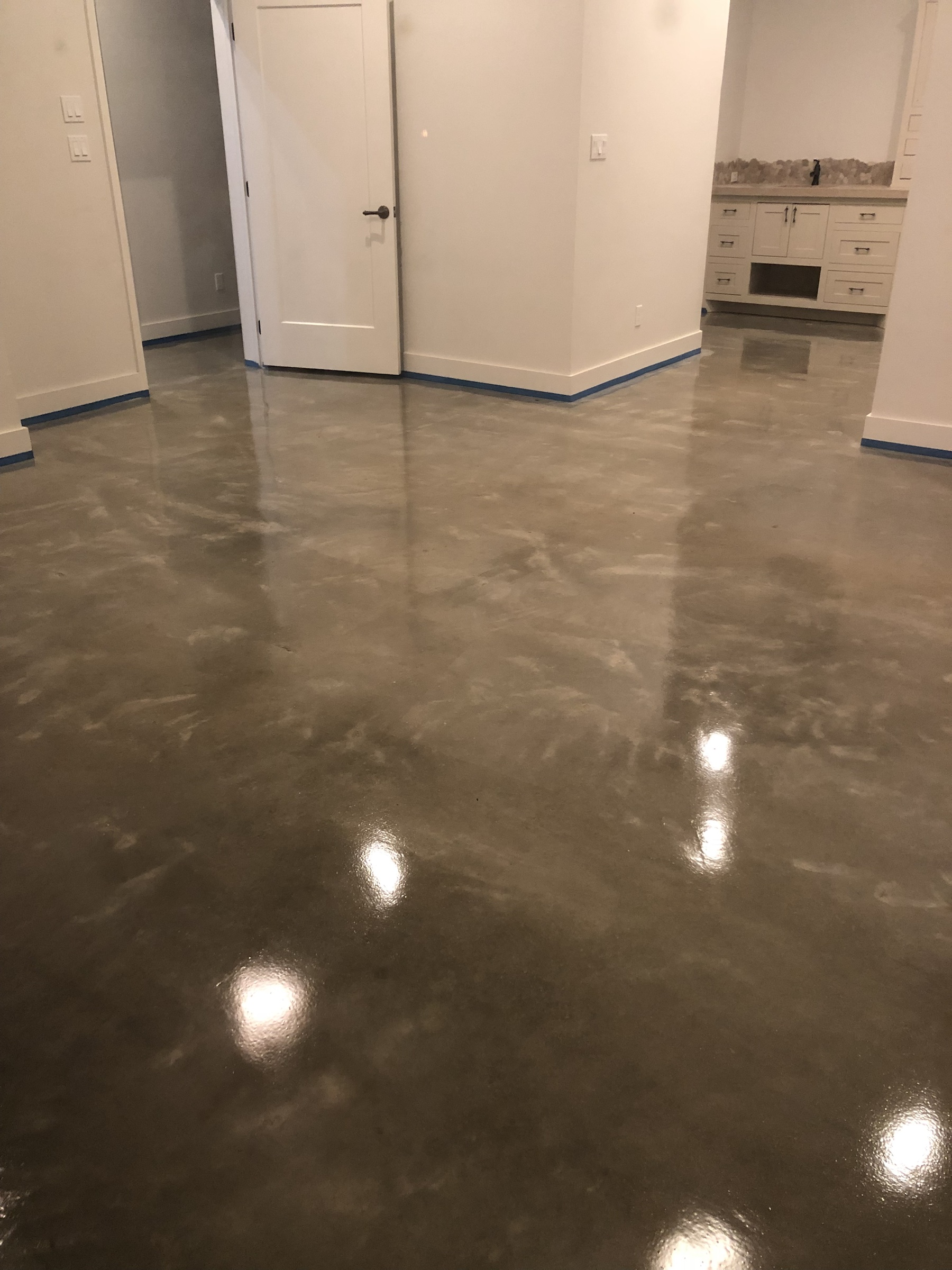 Smooth gray PetraSmooth floor in a finished residential interior